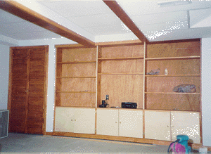 Built-in Shelves into a basement wall.